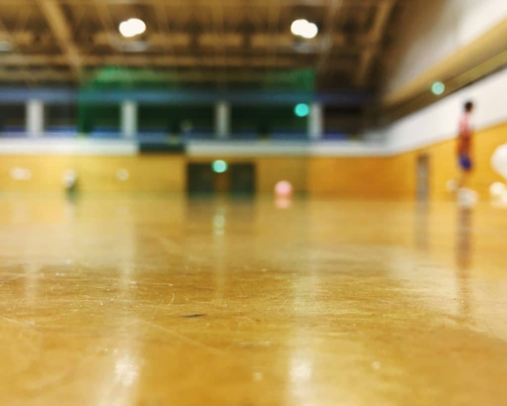 At the gym, sports hall. Futsal practice, basketball court.